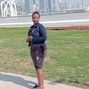 Christine , Kenyan driver, in Qatar