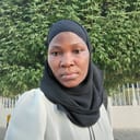 Nahia, Ugandan elder-care worker, in Qatar