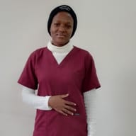 DORINE , Ugandan maid, in Riyadh