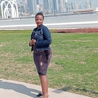 Christine , Kenyan driver, in Qatar