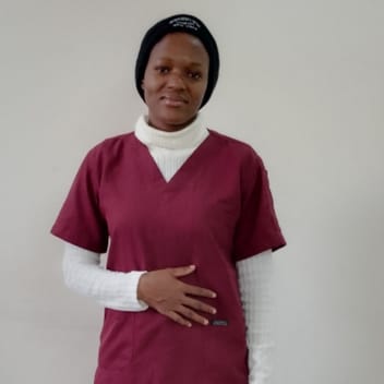 DORINE , Ugandan maid, in Riyadh