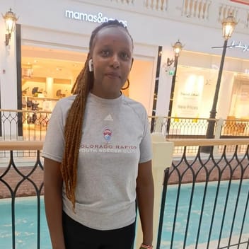 Gloria , Kenyan nanny, in Qatar