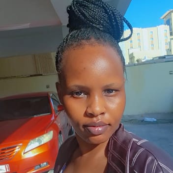 Mercy , Kenyan nanny, in Qatar