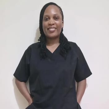 Caroline , Kenyan nanny, in Qatar
