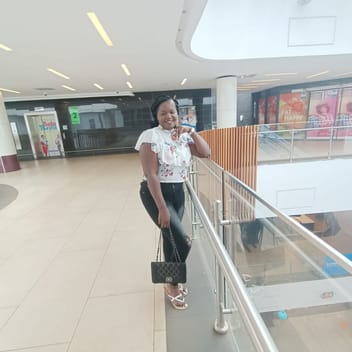 Caroline , Kenyan nanny, in Qatar