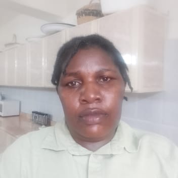 Caroline , Kenyan elder-care worker, in Riyadh