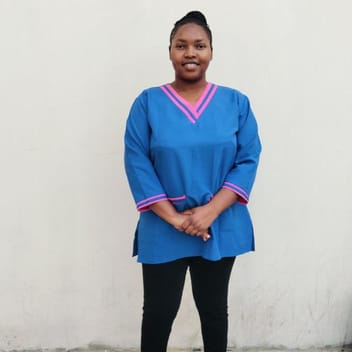Pauline , Kenyan nanny, in Qatar