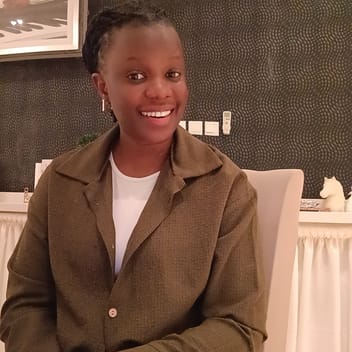 Olivia , Ugandan elder-care worker, in Saudi Arabia