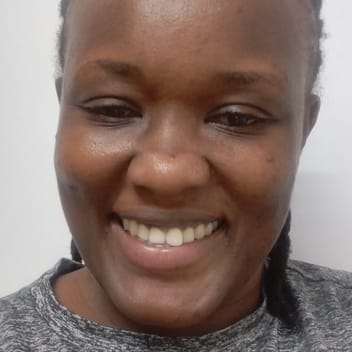 Catherine , Kenyan driver, in Qatar