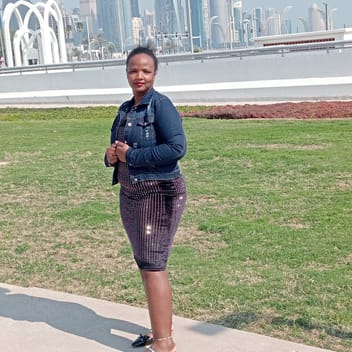 Christine , Kenyan driver, in Qatar