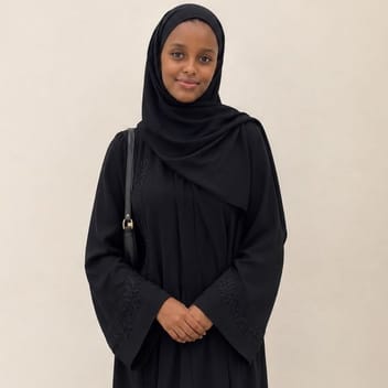 Rebecca , Ugandan nanny, in Qatar