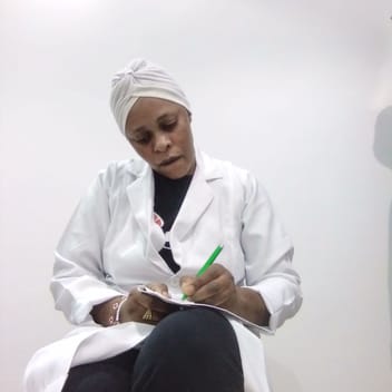 Sally , Kenyan elder-care worker, in Jeddah