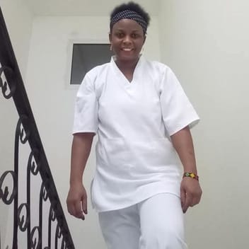 Mercy , Kenyan elder-care worker, in Dammam