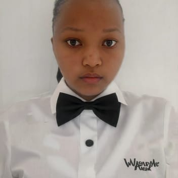 Regina , Kenyan nanny, in Qatar