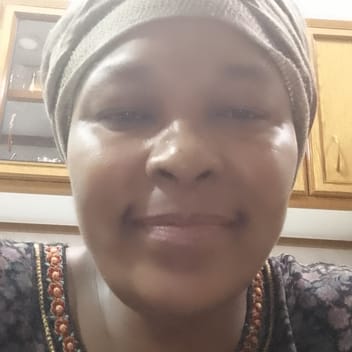 Olympia, Kenyan elder-care worker, in Saudi Arabia