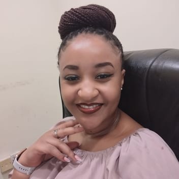 Grace , Kenyan driver, in Qatar