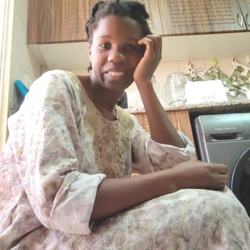 Victorious , Ugandan nanny, in Dubai