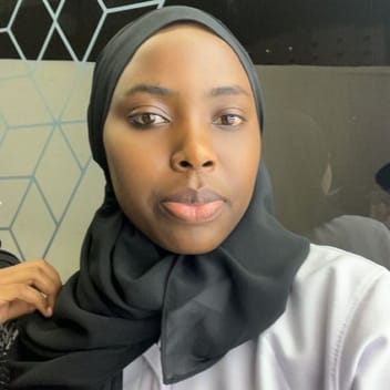 MARTHA , Ugandan nanny, in Qatar