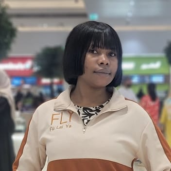 Confidence , Cameroonian nanny, in Dubai