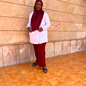 Ann, Kenyan elder-care worker, in Saudi Arabia