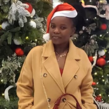 Faith , Kenyan nanny, in Abu Dhabi