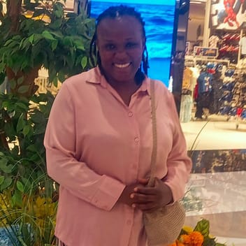 Catherine , Kenyan driver, in Qatar
