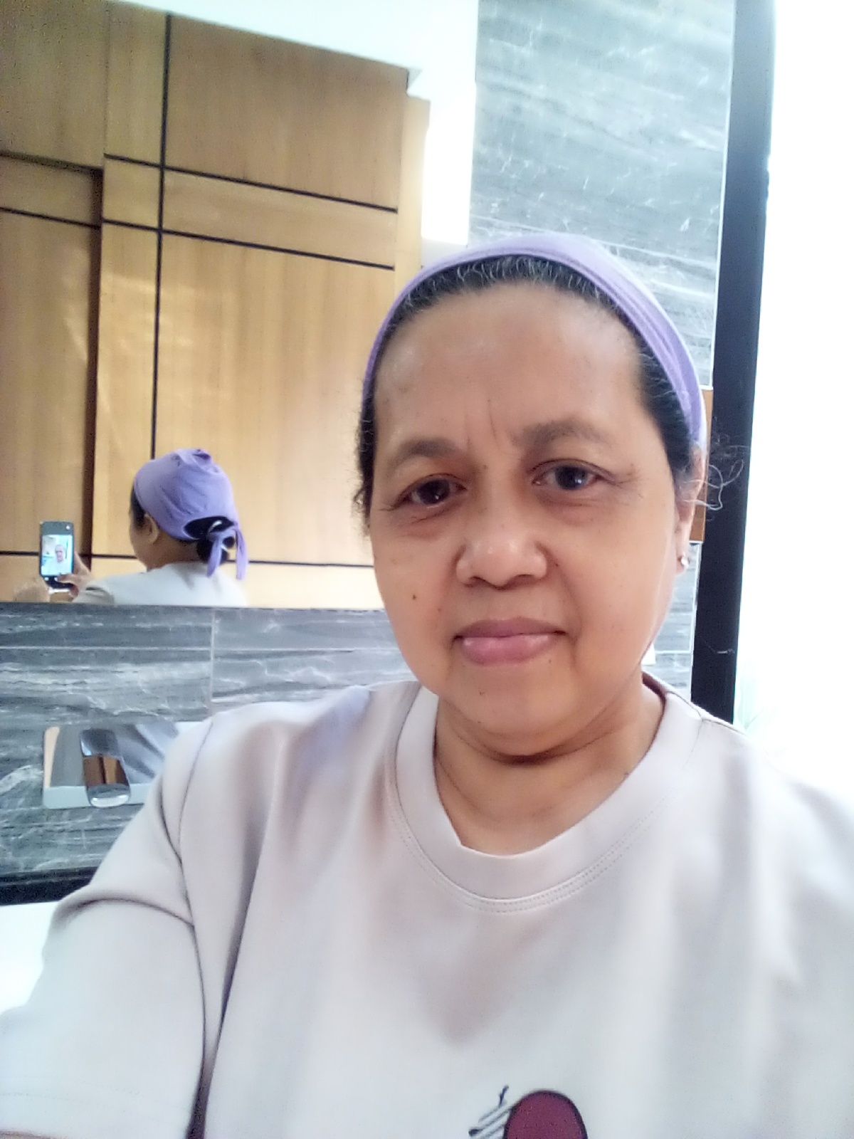 Maria Elena , Filipino nanny, in Riyadh